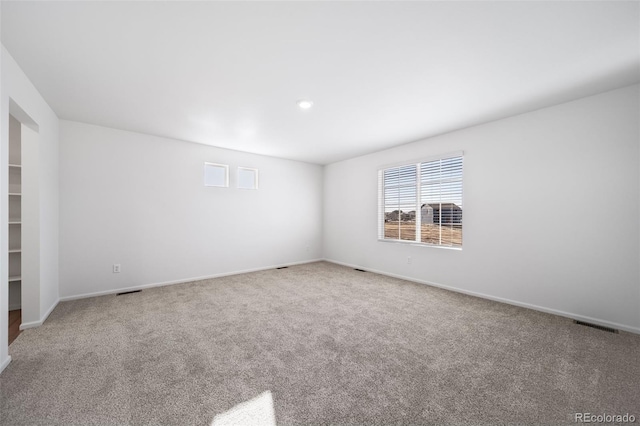 3869 N Shawnee St, Aurora, CO 80019 - unfurnished room featuring carpet floors and baseboards