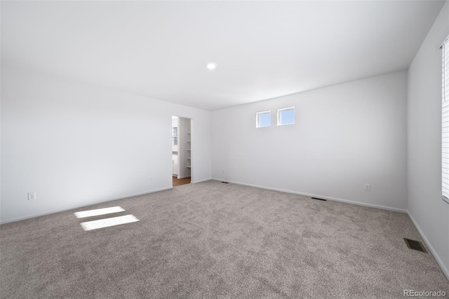 3869 N Shawnee St, Aurora, CO 80019 - unfurnished room with carpet floors and baseboards