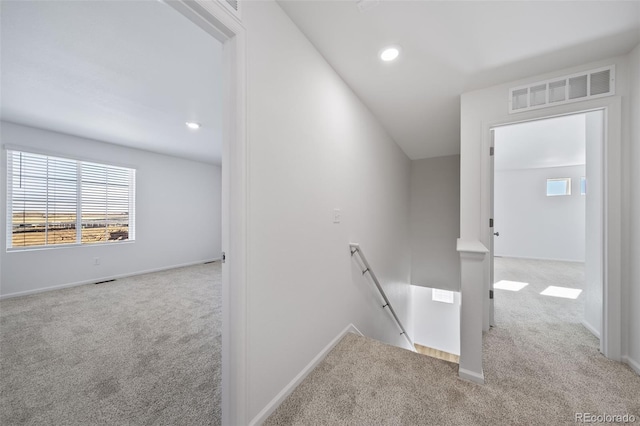 3869 N Shawnee St, Aurora, CO 80019 - hallway featuring an upstairs landing, carpet flooring, baseboards, and recessed lighting