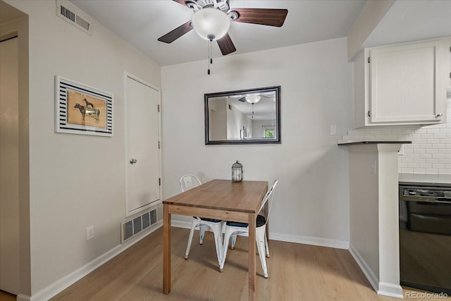 8335 Fairmount Dr Unit 2-105, Denver, CO 80247 - dining space with light wood-style floors, ceiling fan, and baseboards