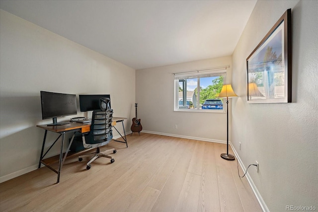 8335 Fairmount Dr Unit 2-105, Denver, CO 80247 - home office with wood finished floors and baseboards