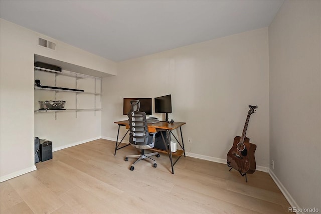 8335 Fairmount Dr Unit 2-105, Denver, CO 80247 - office space featuring wood finished floors and baseboards