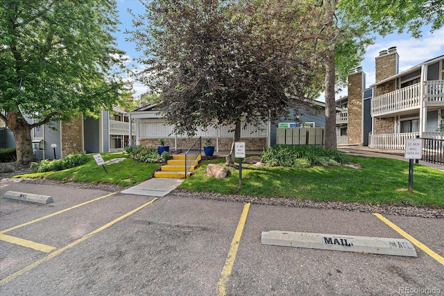 8335 Fairmount Dr Unit 2-105, Denver, CO 80247 - view of uncovered parking lot