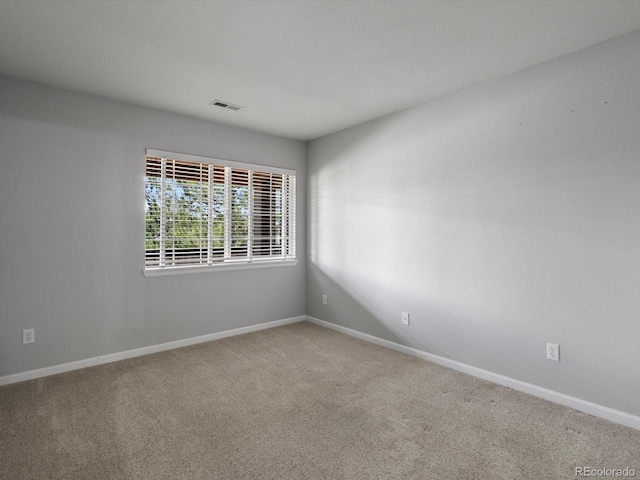 7131 S Wenatchee Way Unit C, Aurora, CO 80016 - empty room featuring carpet floors