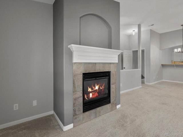 7131 S Wenatchee Way Unit C, Aurora, CO 80016 - detailed view of carpet floors, a fireplace, and a chandelier