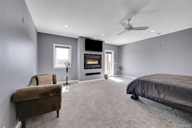 bedroom with ceiling fan and carpet