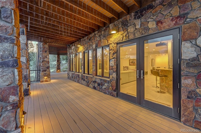 wooden terrace featuring french doors