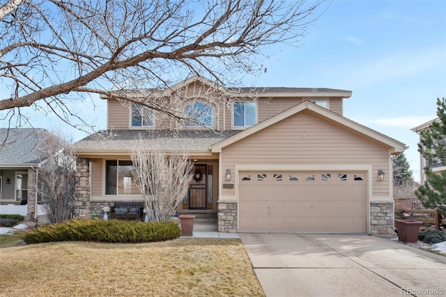 view of front of house with a garage and a front lawn