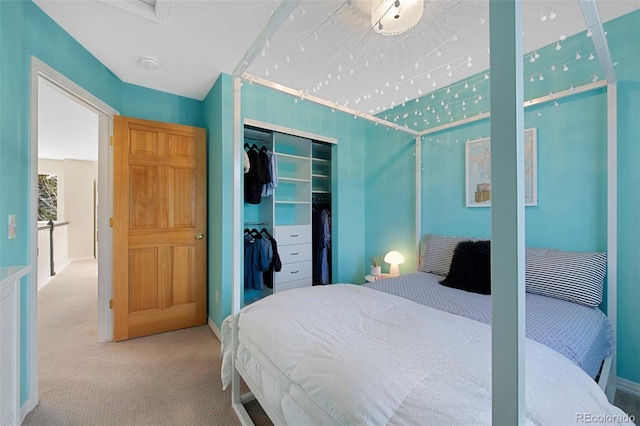 bedroom with carpet floors and a closet