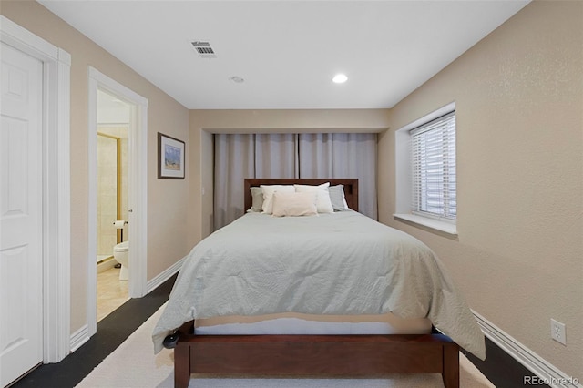 bedroom with ensuite bathroom