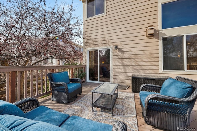 wooden deck featuring an outdoor living space