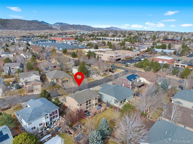 drone / aerial view featuring a mountain view