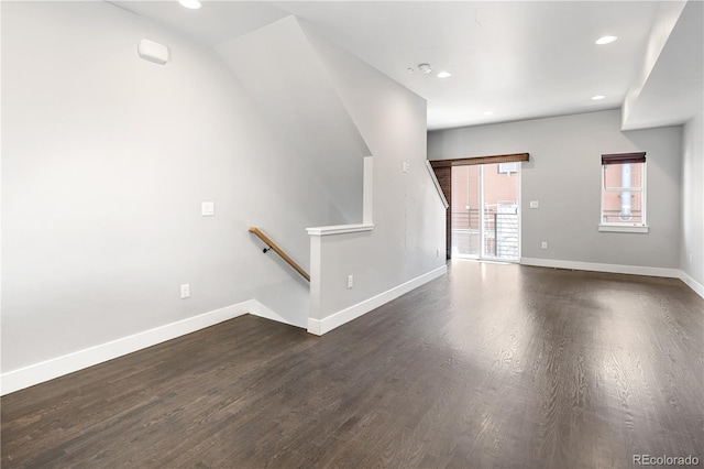 3820 N Olive St Unit 2, Denver, CO 80207 - unfurnished living room with dark wood finished floors and recessed lighting