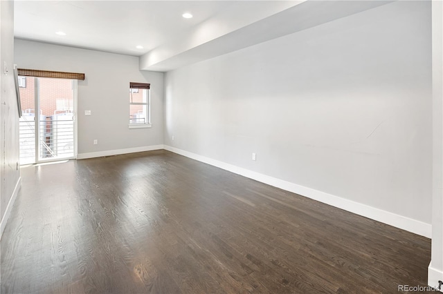 3820 N Olive St Unit 2, Denver, CO 80207 - spare room featuring dark wood-style floors and recessed lighting