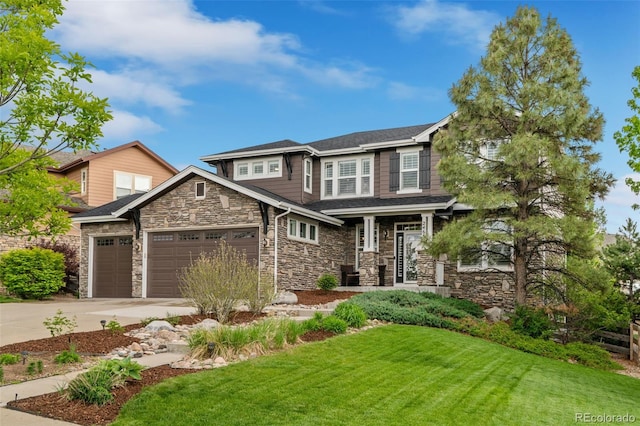24682 E Ontario Dr, Aurora, CO 80016 - craftsman-style house featuring stone siding, driveway, a front lawn, a garage, and a porch