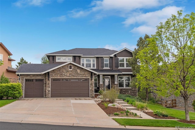 24682 E Ontario Dr, Aurora, CO 80016 - craftsman-style house featuring stone siding, a garage, and concrete driveway