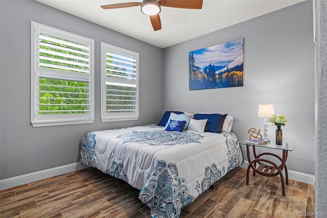 24682 E Ontario Dr, Aurora, CO 80016 - bedroom with wood finished floors, baseboards, a ceiling fan, and a textured wall
