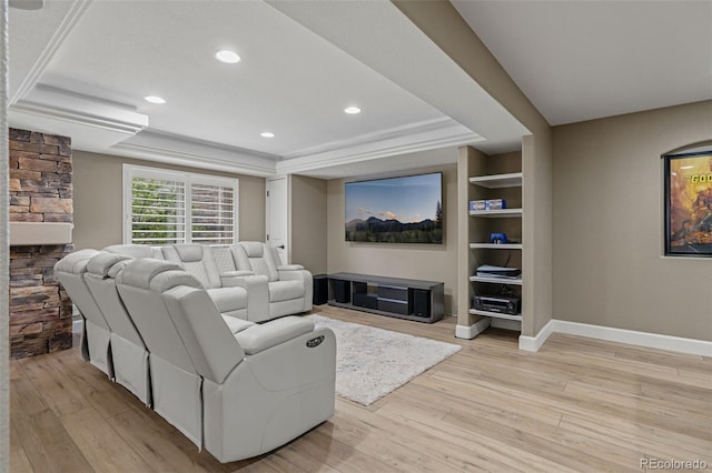 24682 E Ontario Dr, Aurora, CO 80016 - living area featuring a raised ceiling, light wood-type flooring, baseboards, recessed lighting, and a fireplace