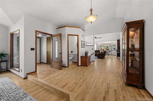 17815 Saddlewood, Monument, CO 80132 - foyer entrance with a ceiling fan, light wood-type flooring, french doors, and high vaulted ceiling
