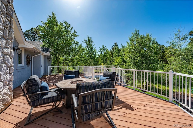 17815 Saddlewood, Monument, CO 80132 - wooden deck with outdoor dining area