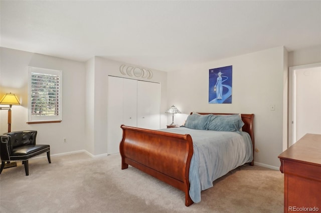 carpeted bedroom featuring a closet