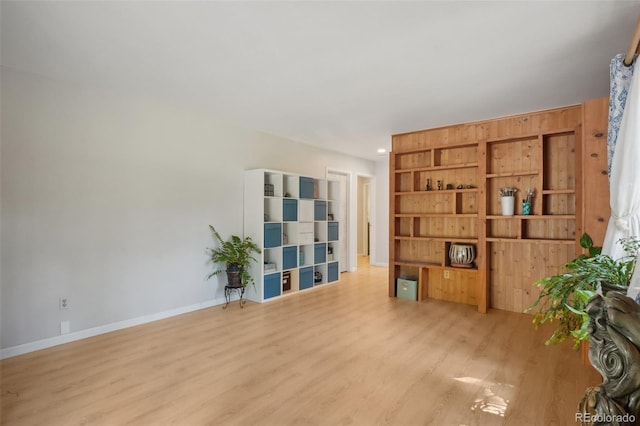 spare room featuring light hardwood / wood-style floors