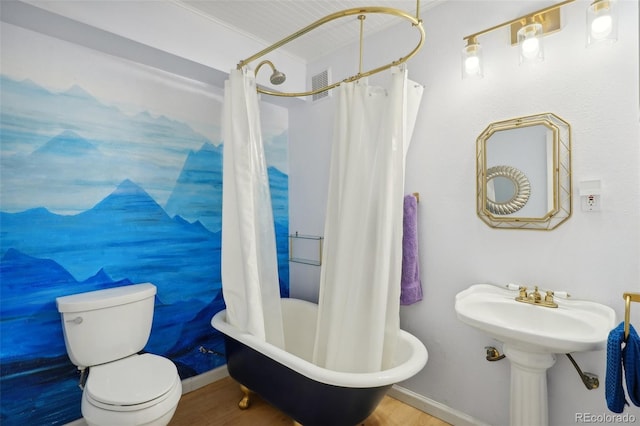 bathroom featuring shower / bath combination with curtain, toilet, and wood-type flooring