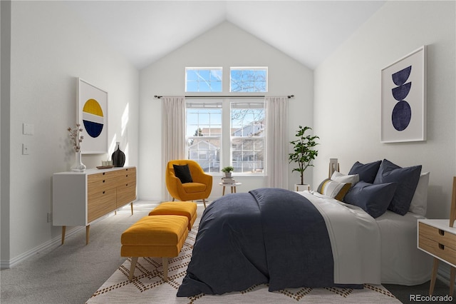 carpeted bedroom with high vaulted ceiling