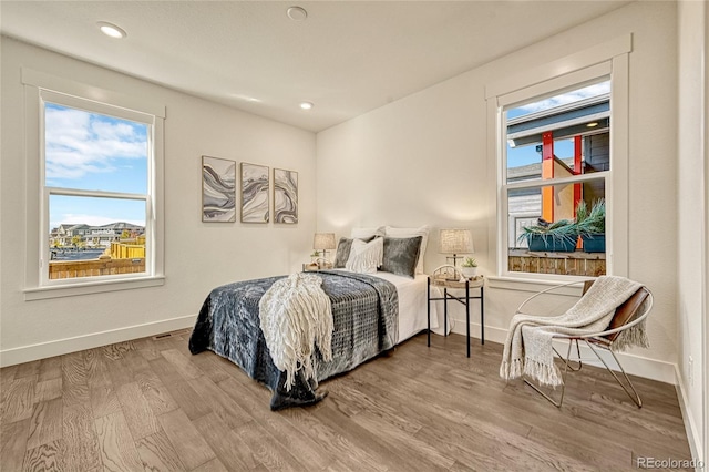 bedroom with wood-type flooring