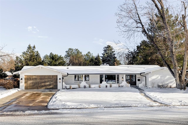 ranch-style home with a garage