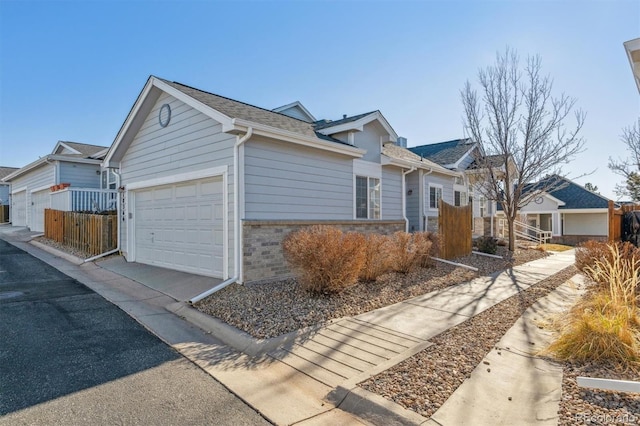 single story home featuring a garage