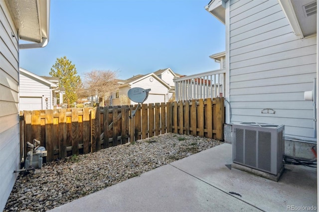 view of patio with central AC