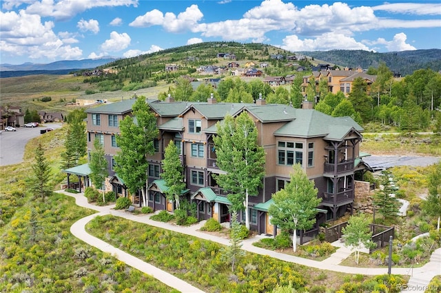 drone / aerial view featuring a mountain view