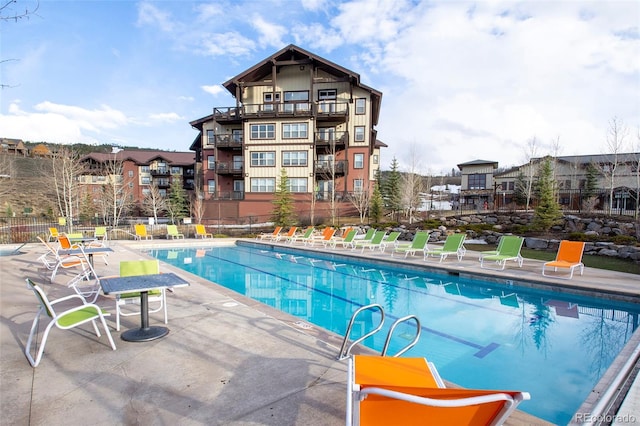 view of pool with a patio area