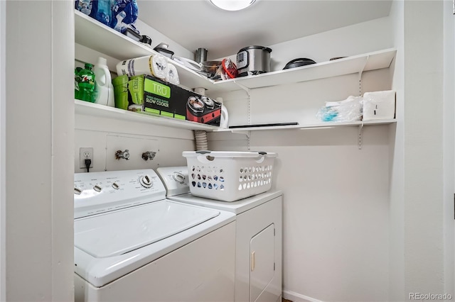 laundry room featuring independent washer and dryer