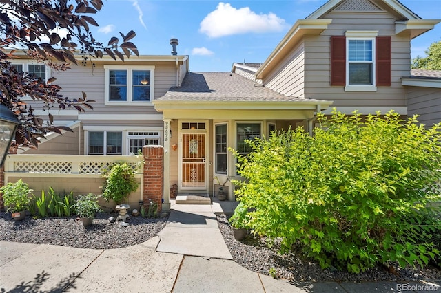 9869 Julian Way # B, Westminster, CO 80031 - traditional-style home with roof with shingles