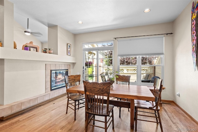 9869 Julian Way # B, Westminster, CO 80031 - dining space featuring wood finished floors, a tile fireplace, recessed lighting, and a ceiling fan
