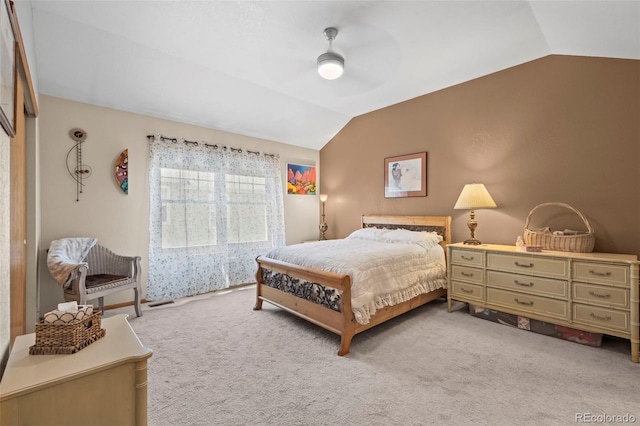 9869 Julian Way # B, Westminster, CO 80031 - bedroom with lofted ceiling, light carpet, and a ceiling fan