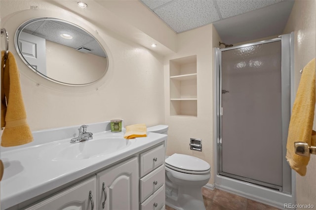 9869 Julian Way # B, Westminster, CO 80031 - bathroom with a shower stall, vanity, built in features, and a drop ceiling
