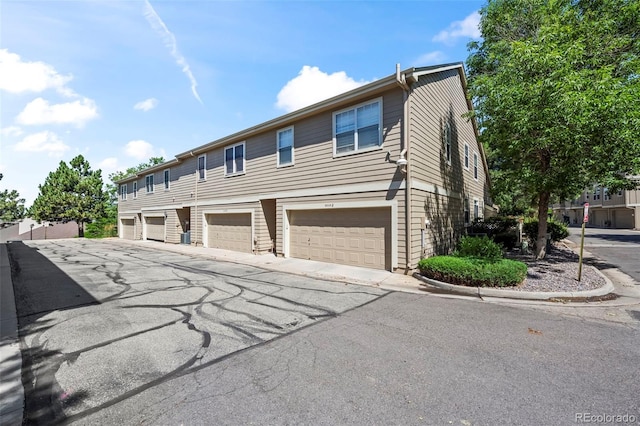 9869 Julian Way # B, Westminster, CO 80031 - view of property with driveway
