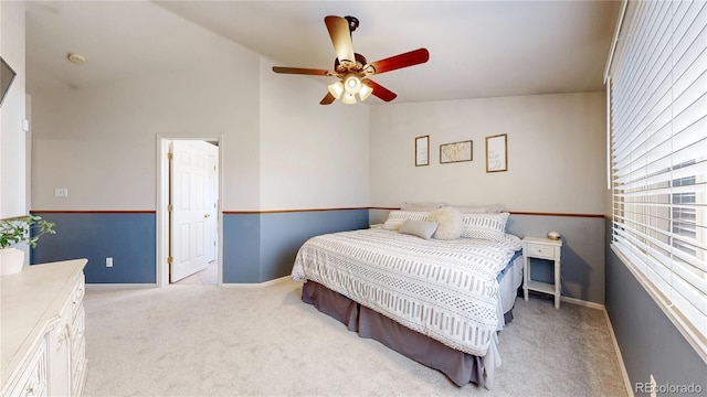 11560 River Run Cir, Commerce City, CO 80640 - carpeted bedroom featuring vaulted ceiling, baseboards, and ceiling fan