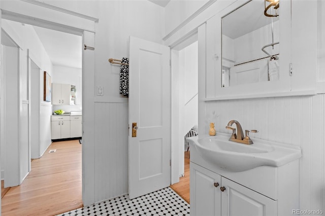 bathroom featuring tile patterned floors and vanity