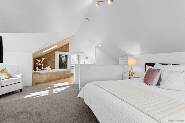 carpeted bedroom with vaulted ceiling