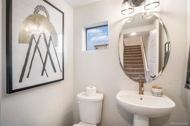 bathroom with sink and toilet