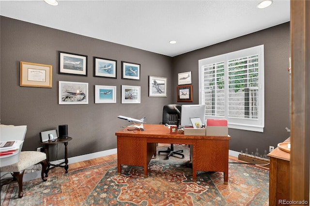 31189 Manitoba Dr, Evergreen, CO 80439 - home office with wood finished floors and recessed lighting
