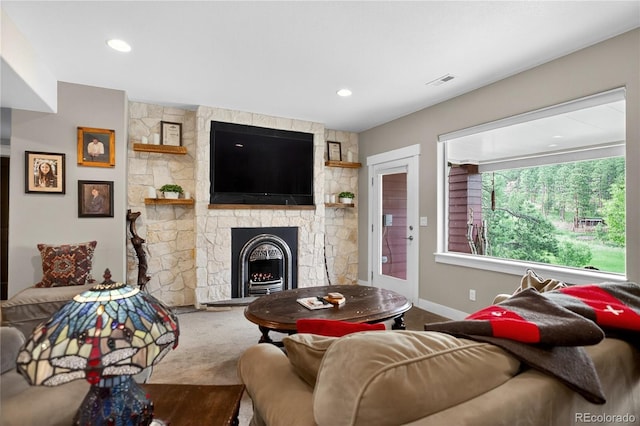 31189 Manitoba Dr, Evergreen, CO 80439 - living area with a stone fireplace and recessed lighting