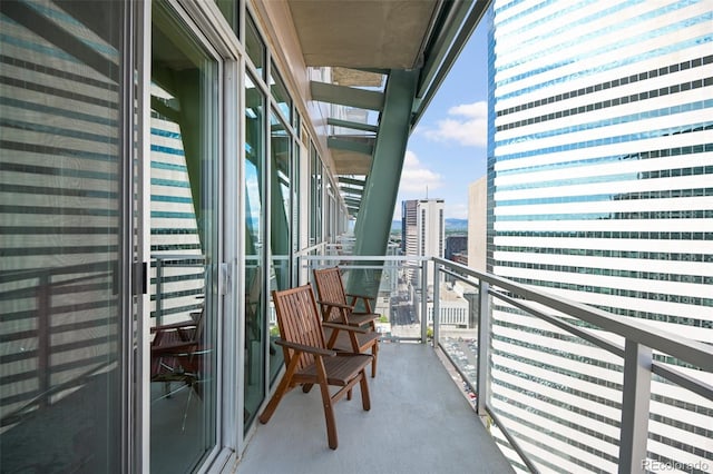 balcony featuring a city view