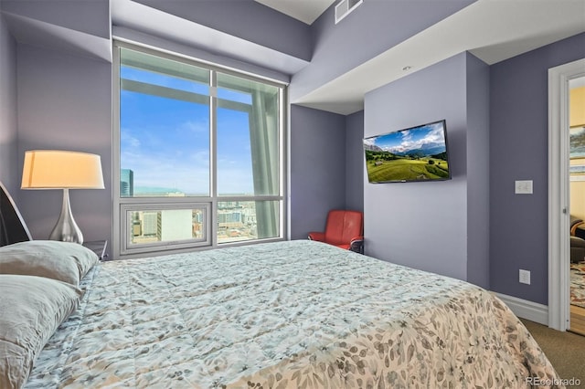 2001 Lincoln St Unit 2420, Denver, CO 80202 - bedroom with carpet flooring and baseboards