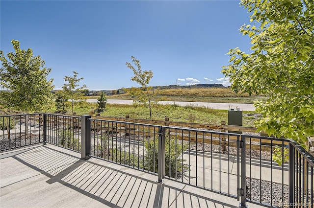 view of patio / terrace with a water view