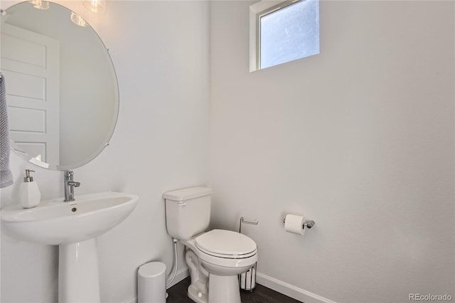 bathroom featuring toilet